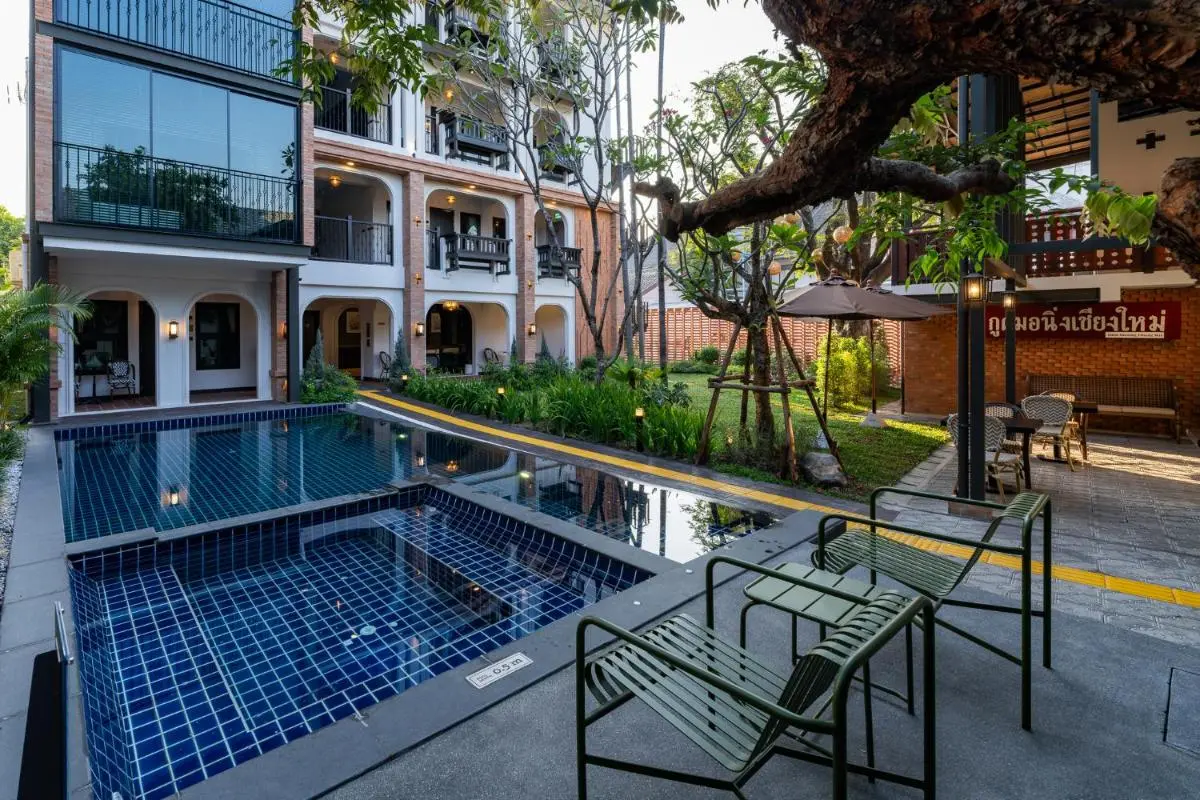 Outdoor Pool Area and Garden Seating with Lounge Chairs in Phra Sing Chiang Mai