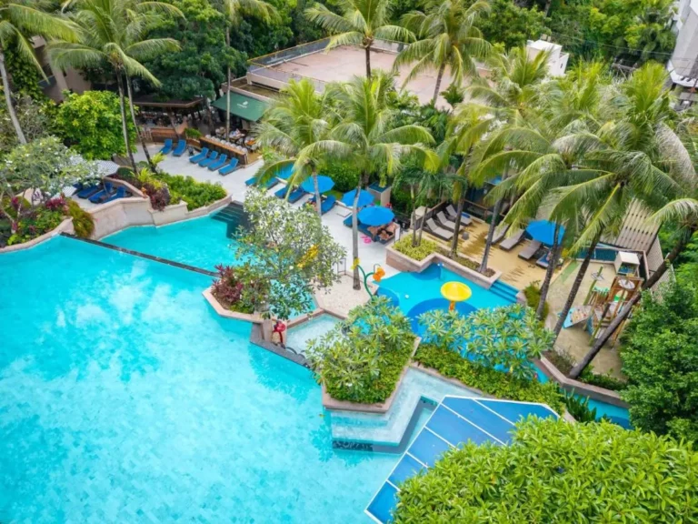 Outdoor Pool Area with Children’s Splash Zone and Lounge Seating at Kata Beach