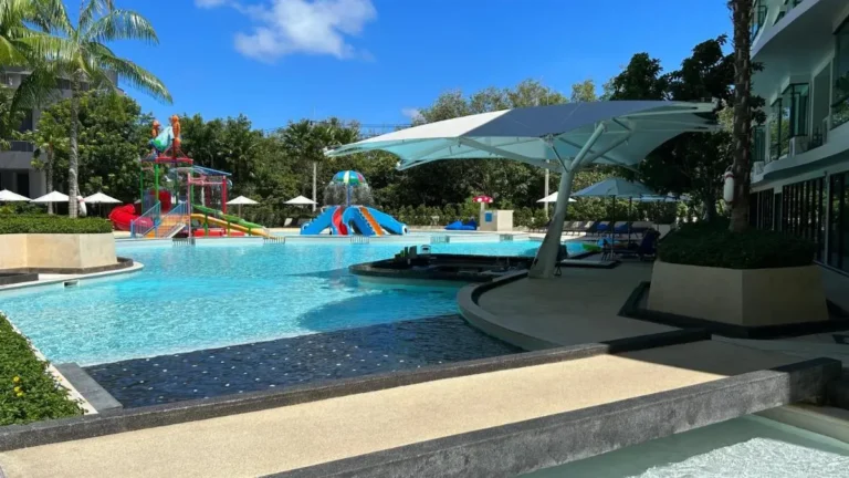 Outdoor Pool Area with Children’s Water Slides and Jacuzzi at Rawai Beach