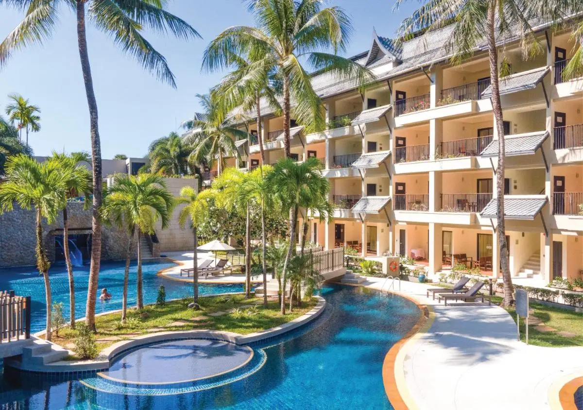 Outdoor Pool Area with Freeform Design and Tropical Landscaping at Kamala Beach