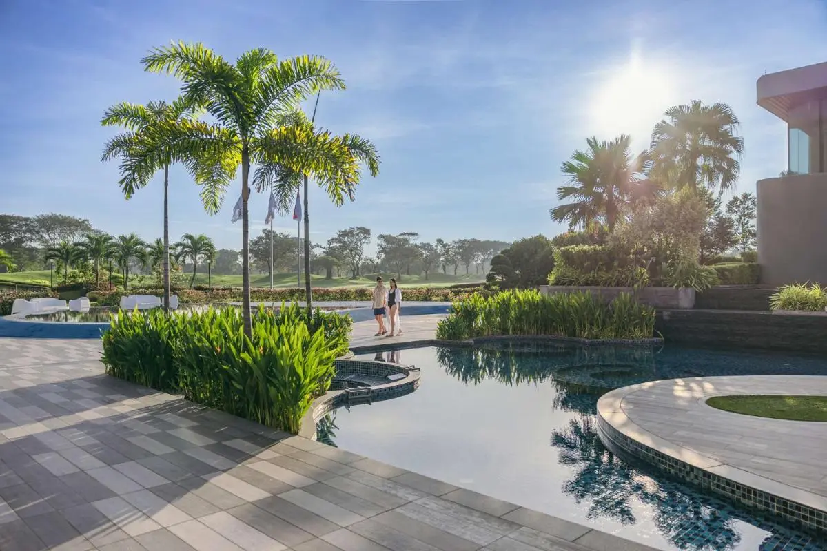Dusit Thani Laguna Singapore Outdoor Pool Area with Jacuzzi and Tropical Landscaping in Singapore