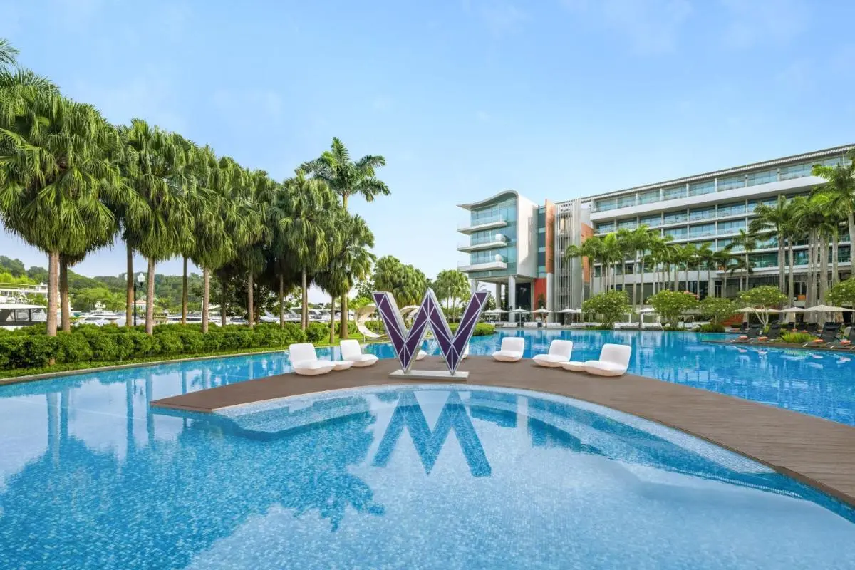 W Singapore - Sentosa Cove Outdoor Pool Area with Lounge Seating and Waterfront Views on Sentosa Island