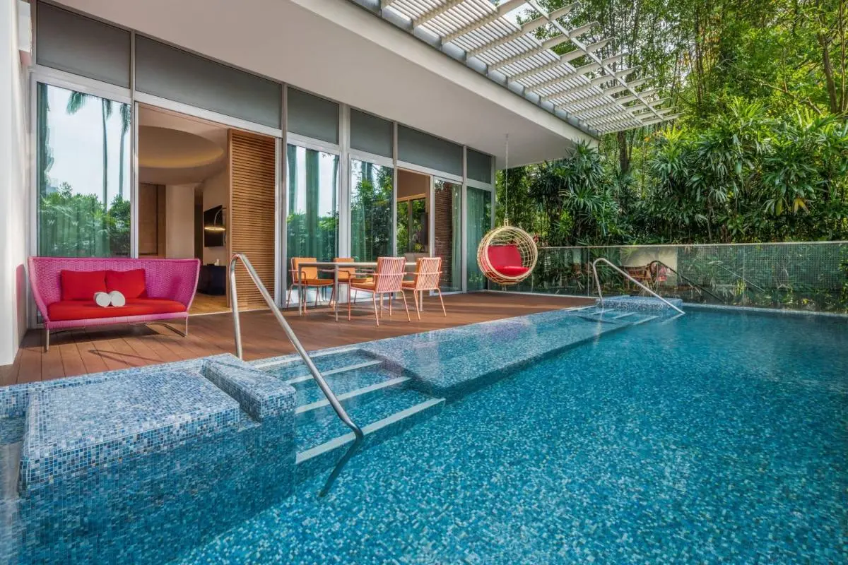 Outdoor Pool Area with Seating and Pergola on Sentosa Island