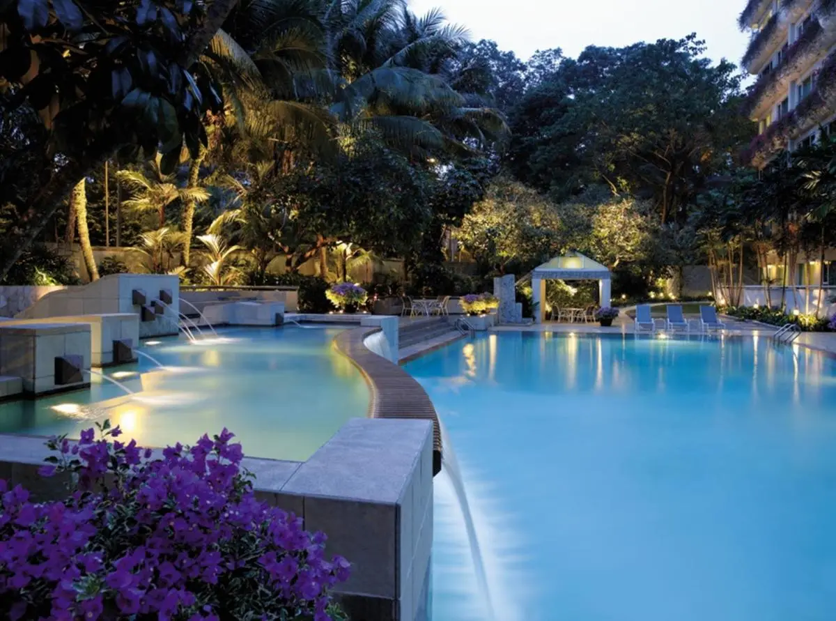 Outdoor Pool Area with Spa and Jacuzzi Features in Singapore City