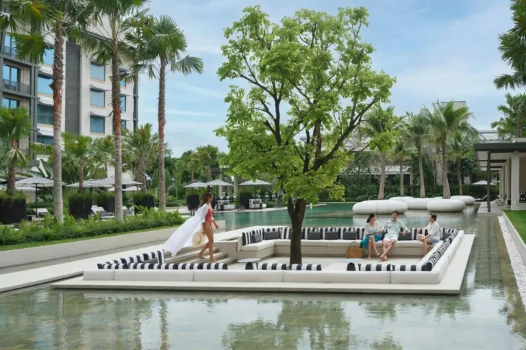 Outdoor Pool Area with Sunken Seating and Tropical Surroundings in Sentosa Island