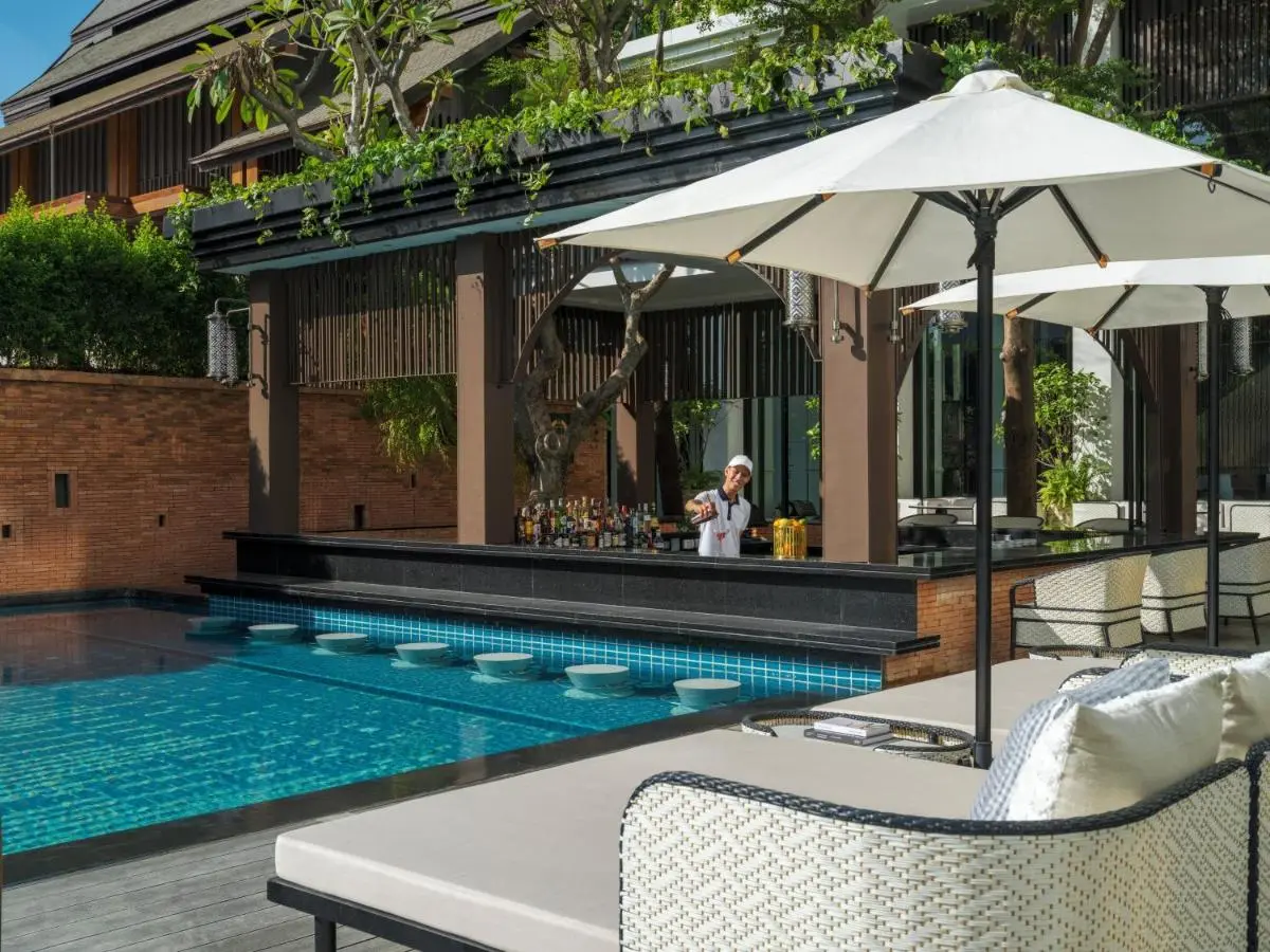 Outdoor Pool with Swim-Up Bar and Lounge Area in Chang Khlan Chiang Mai
