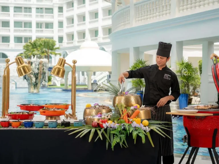 Outdoor Poolside Dining Setup with Buffet and Grill Near Jacuzzi Area at Patong Beach