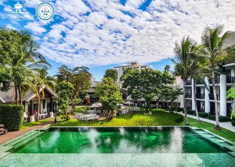 Outdoor Rectangular Swimming Pool and Garden Area with Seating in Hai Ya Chiang Mai