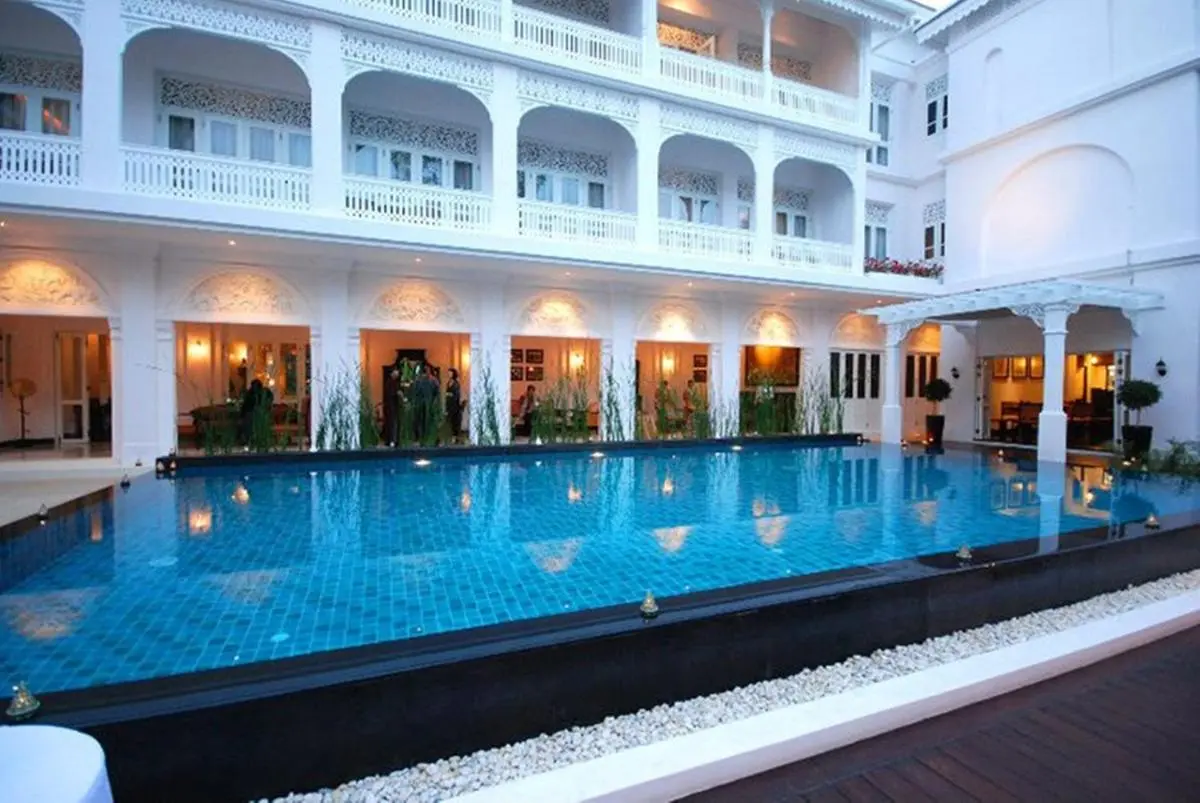 Outdoor Rectangular Swimming Pool with Arched Courtyard in Chang Khlan Chiang Mai