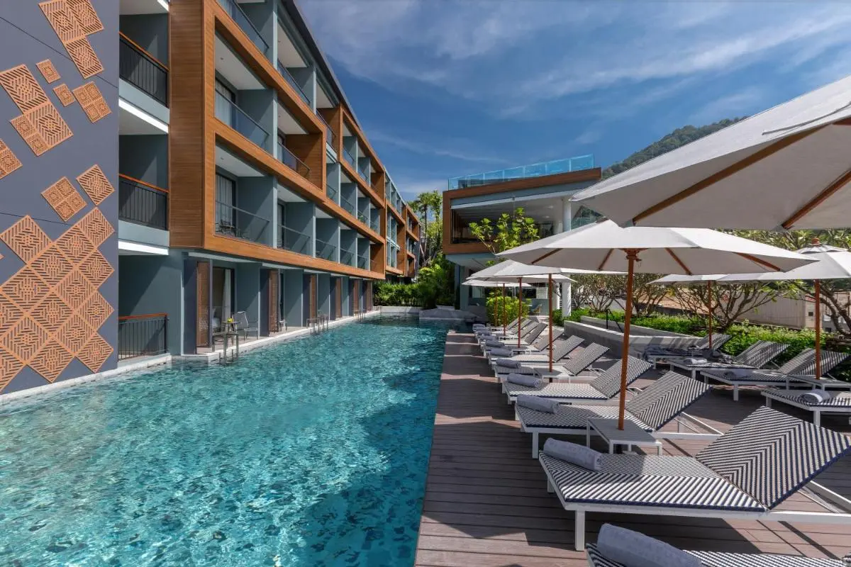 The Nature Phuket Outdoor Rectangular Swimming Pool with Lounge Area and Modern Architecture at Patong Beach