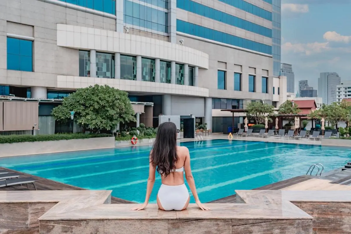 Outdoor Rectangular Swimming Pool with Lounge Area in Pathumwan Urban Setting