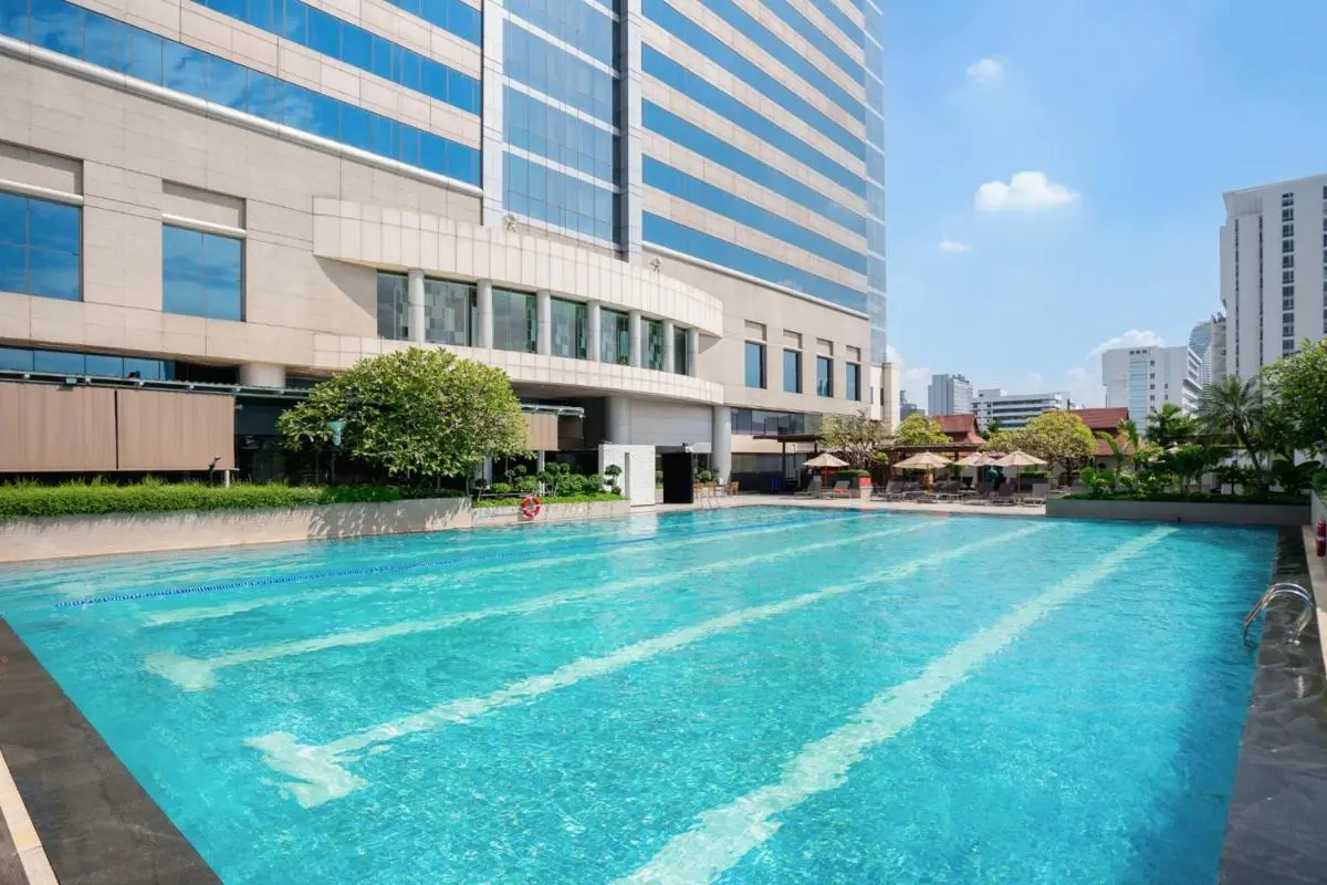 Pathumwan Princess Hotel Outdoor Rectangular Swimming Pool with Lounge Area in Pathumwan Urban Setting