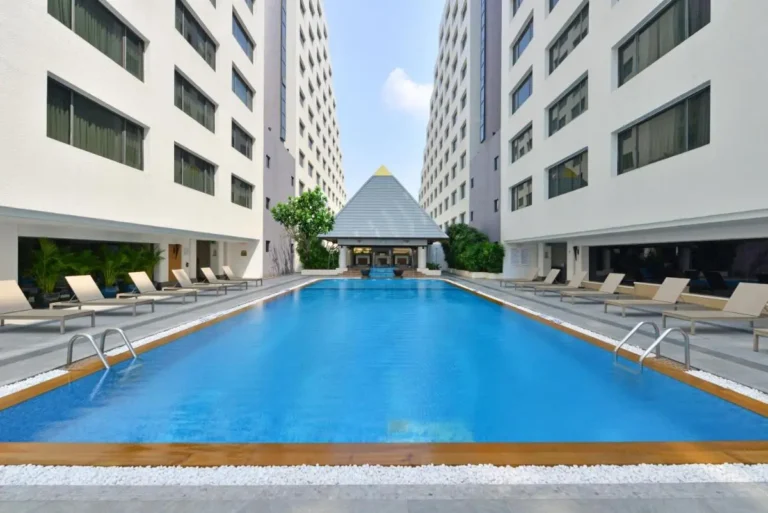 Outdoor Rectangular Swimming Pool with Lounge Chairs and Pavilion in Pathumwan Bangkok
