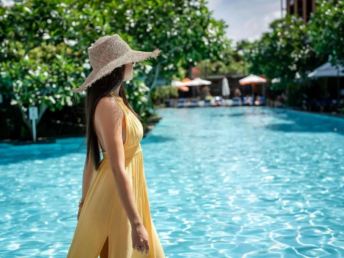 Outdoor Rectangular Swimming Pool with Lounge Chairs and Umbrellas at Karon Beach