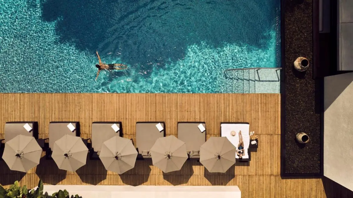 Bangkok Outdoor Rectangular Swimming Pool with Lounge Chairs and Umbrellas in Sathorn City