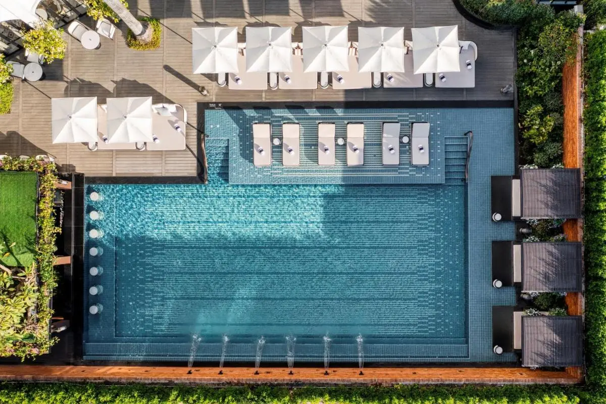 Outdoor Rectangular Swimming Pool with Lounge Chairs and Water Jets in Chang Khlan Chiang Mai