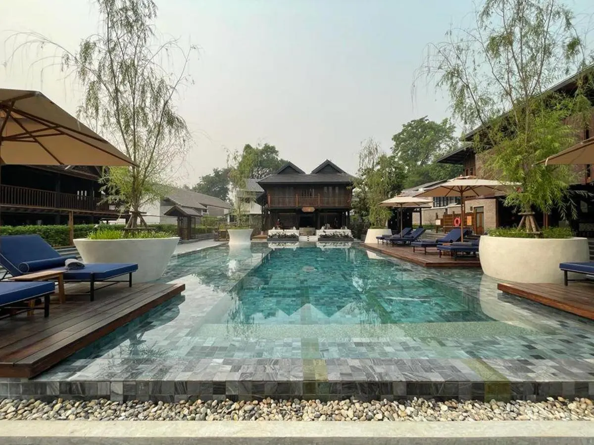 Aleenta Retreat Chiang Mai - The Leading Hotels of the World Outdoor Rectangular Swimming Pool with Lounge Chairs and Wooden Decks in Chiang Mai Chiang Mai Province