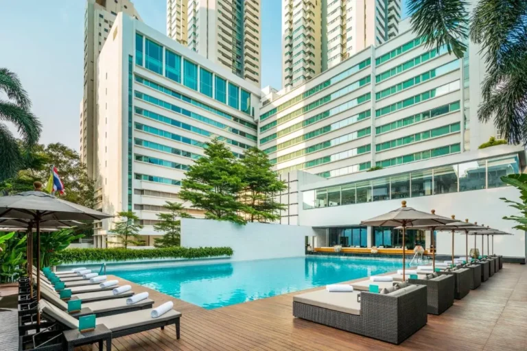 Outdoor Rectangular Swimming Pool with Lounge Seating in Sathorn Urban Complex Outdoor Rectangular Swimming Pool with Lounge Seating in Sathorn Urban Complex