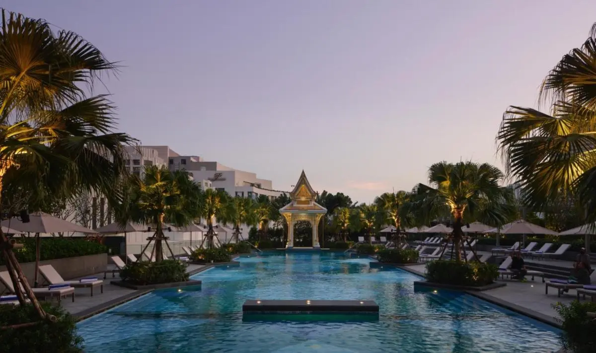 Outdoor Rectangular Swimming Pool with Palm Trees and Pavilion in Ratchathewi Bangkok