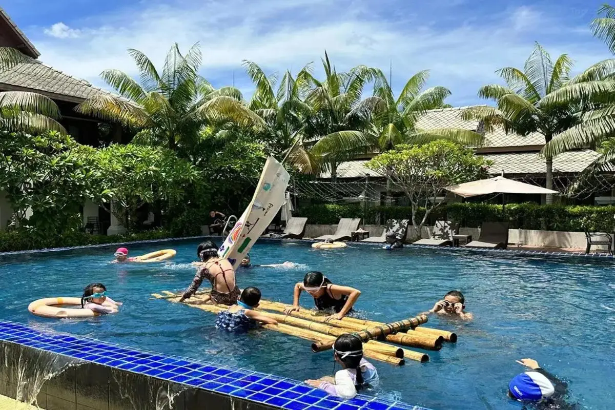 Outdoor Rectangular Swimming Pool with Tropical Surroundings in Chiang Mai City