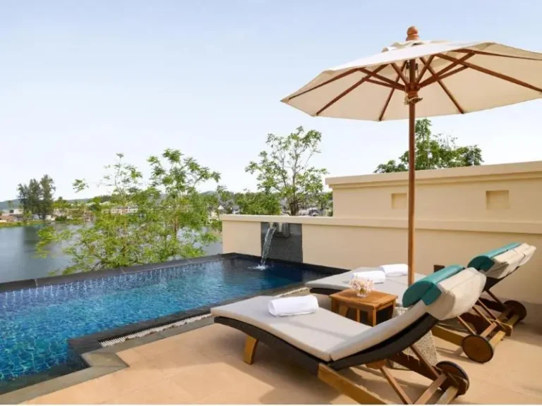 Outdoor Relaxation Area with Small Pool and Lounge Chairs at Bang Tao Beach