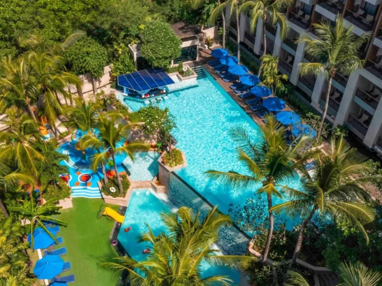 Outdoor Resort Pool Area with Swim-Up Bar and Children’s Water Play at Kata Beach