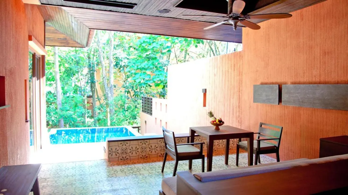 Outdoor Seating Area with Small Pool and Natural Surroundings at Panwa Beach