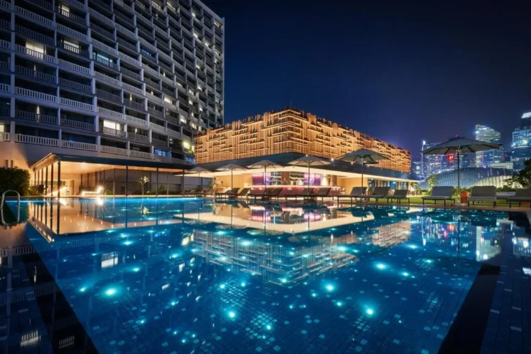 Outdoor Swimming Pool and Lounge Area with City Views in Marina Bay Singapore