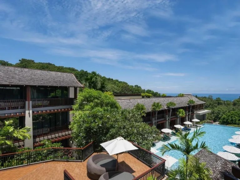 Outdoor Swimming Pool and Relaxation Area with Ocean View Near Patong Beach