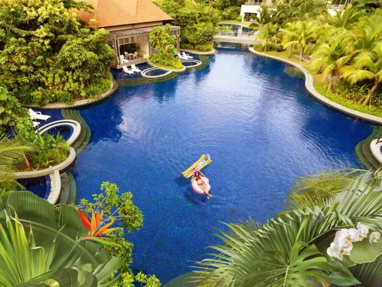Outdoor Swimming Pool and Relaxation Area with Pavilion and Loungers in Singapore