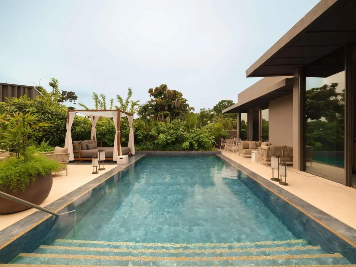 Outdoor Swimming Pool and Relaxation Area with Seating on Sentosa Island