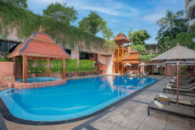 Outdoor Swimming Pool and Relaxation Area with Traditional Pavilion in Khlong Toei