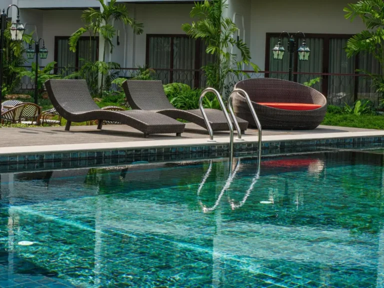 Outdoor Swimming Pool and Relaxation Deck with Lounge Chairs in Fa Ham Chiang Mai