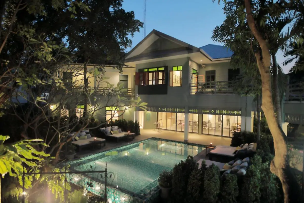 Outdoor Swimming Pool and Seating Area at Residential Property in Phra Nakhon City