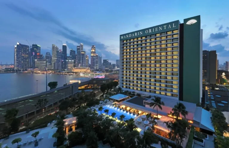 Outdoor Swimming Pool and Waterfront Views at Marina Bay High-Rise Hotel