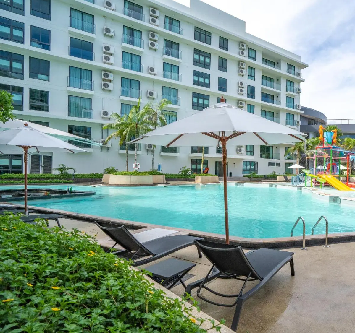Wyndham La Vita Rawai Phuket Outdoor Swimming Pool Area with Children’s Water Play Features in Rawai Beach