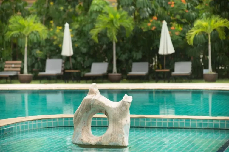 Outdoor Swimming Pool Area with Circular and Rectangular Pools at Rawai Beach