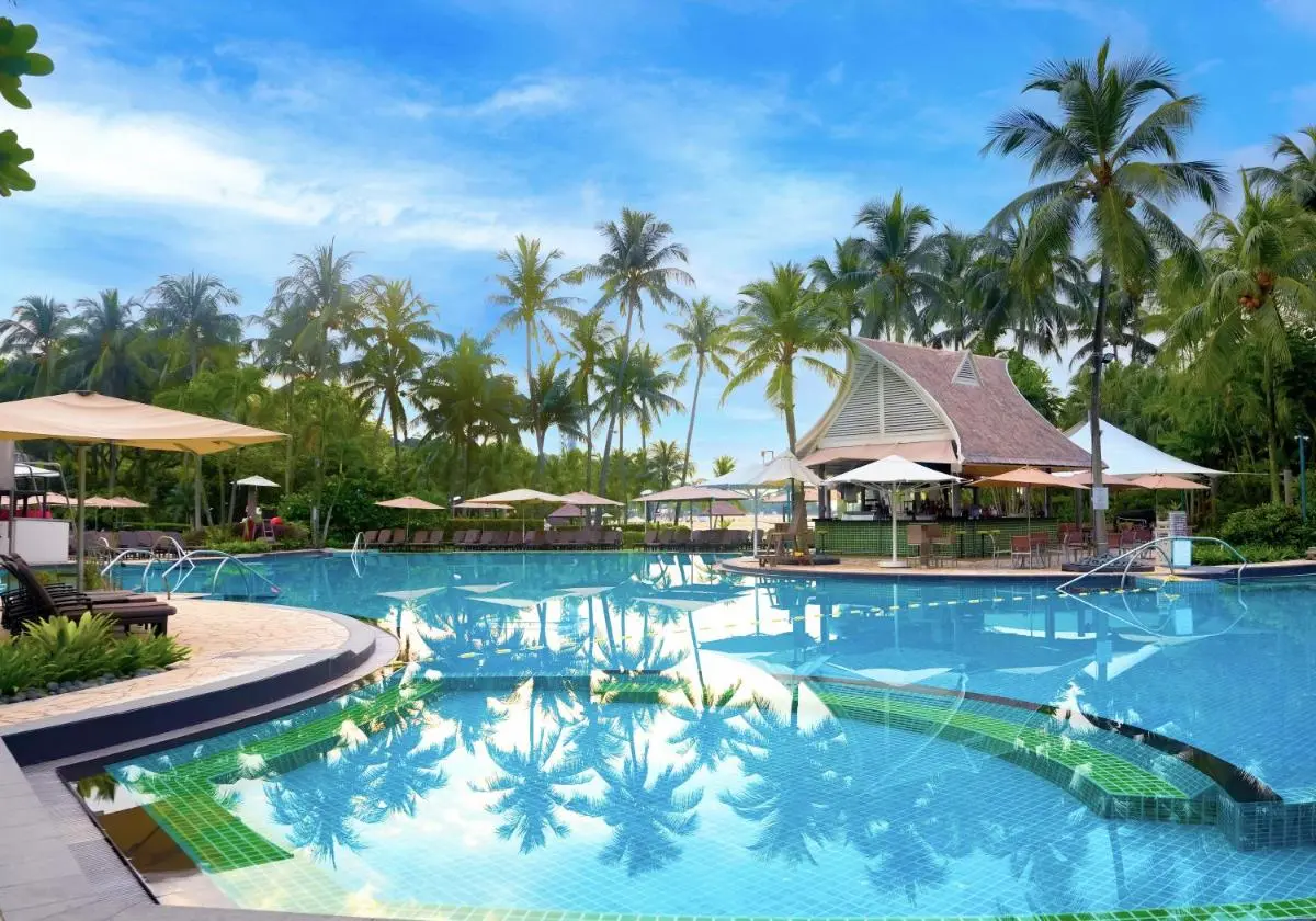 Outdoor Swimming Pool Area with Pavilion and Sun Loungers in Singapore