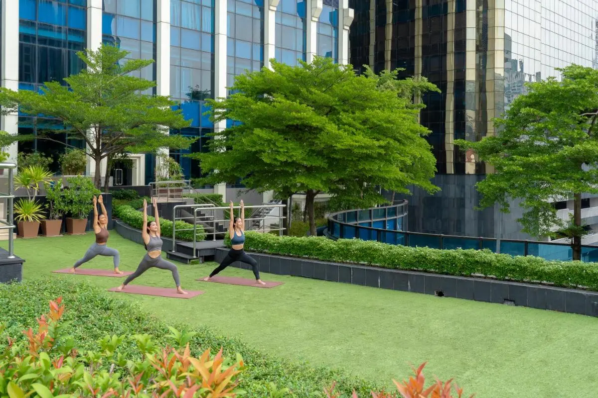 Outdoor Urban Wellness Area with Yoga Space and Greenery in Pathumwan Bangkok