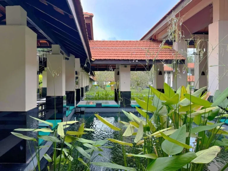 Outdoor Water Feature with Covered Walkways and Greenery in Singapore Outdoor Water Feature with Covered Walkways and Greenery in Singapore