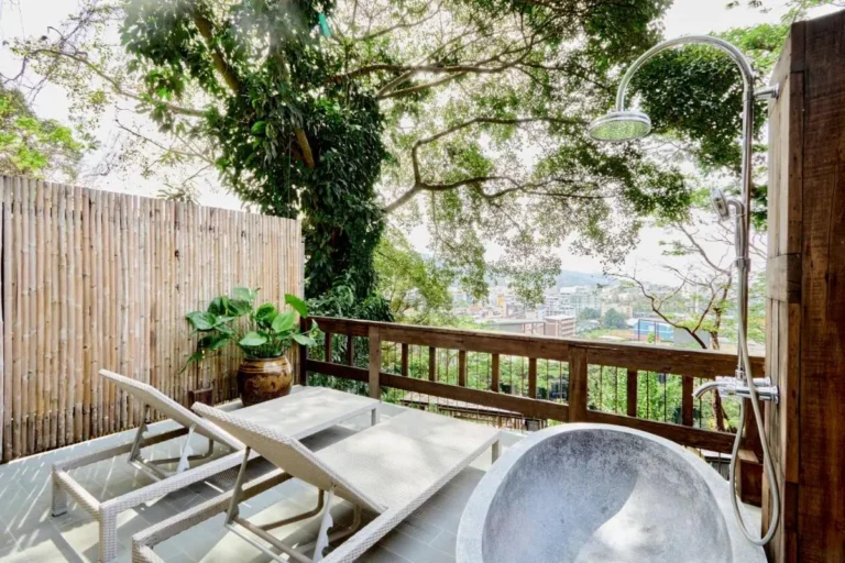 Outdoor Wellness Area with Lounge Chairs and Shower on Patong Beach Balcony