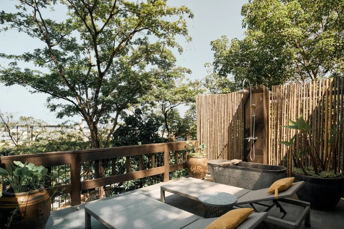 Phuket Province Outdoor Wooden Deck with Stone Bathtub and Lounge Chairs Near Patong Beach