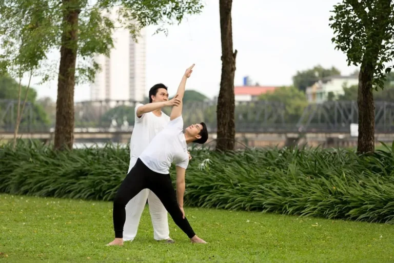 Outdoor Yoga and Stretching Exercise in Chang Khlan Chiang Mai Park Setting Outdoor Yoga and Stretching Exercise in Chang Khlan Chiang Mai Park Setting