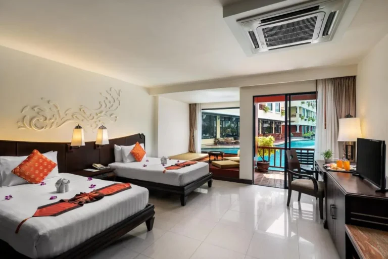 Poolside Room with Direct Access to Swimming Pool and Outdoor Seating Area at Patong Beach