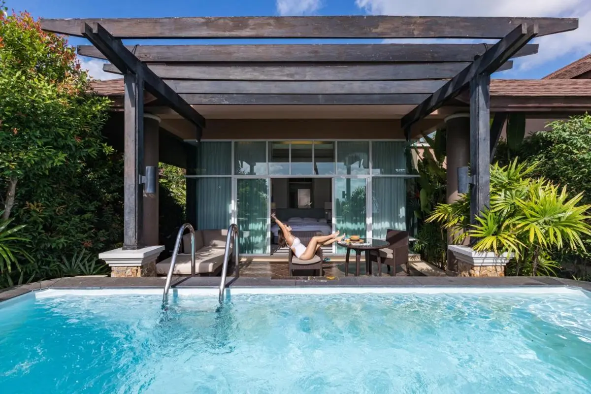 Private Outdoor Pool and Shaded Patio Area with Lounge Seating at Panwa Beach