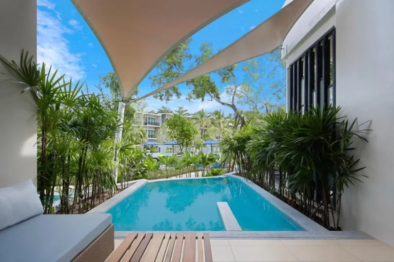 Private Rectangular Pool with Cushioned Seating and Sunshades Near Mai Khao Beach