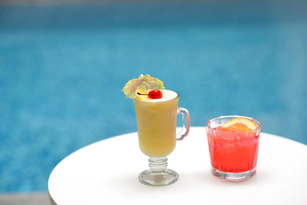 Refreshing Poolside Drinks by a Clear Blue Swimming Pool in Phra Nakhon