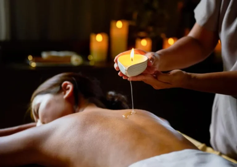 Relaxing Candlelit Massage Therapy Session in a Spa Room Near Panwa Beach