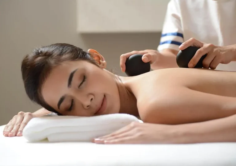 Relaxing Hot Stone Massage Therapy in a Calm Spa Room in Wattana Bangkok