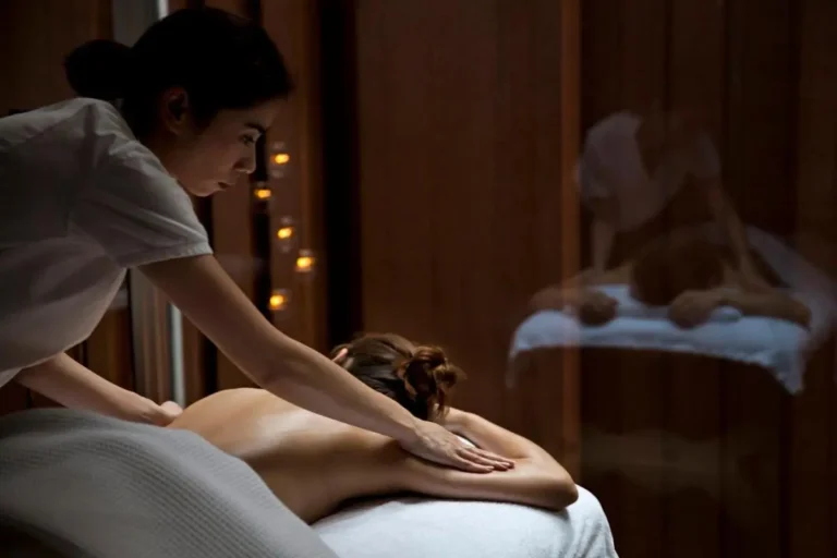 Relaxing Indoor Massage Therapy Room with Warm Lighting in Sathorn Wellness Center